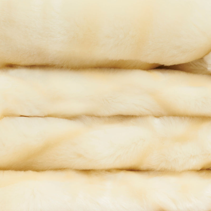close up view of milk faux fur blanket