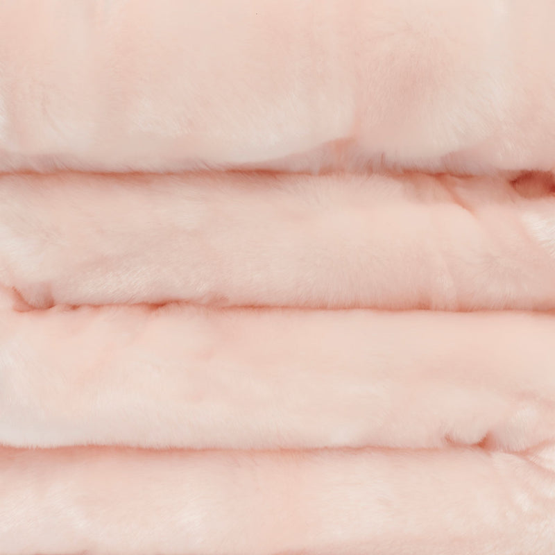 close up view of pink ice faux fur blanket