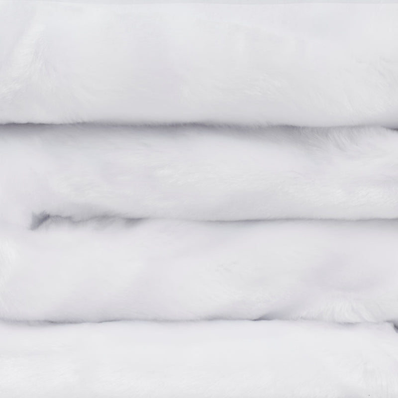 close up view of folded minimink white faux fur blanket