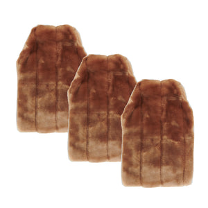 three faux fur hot water bottle covers in honey on cream background