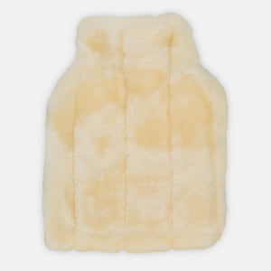 minimink faux fur hot water bottle cover in milk on cream background